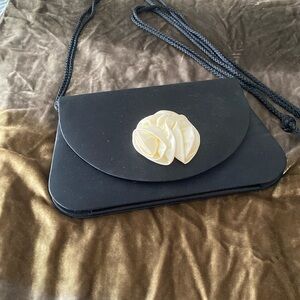 Ready for Holiday events! Black evening bag with snap closure